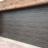 Garage sectional doors 40 mm RIB / woodgrain color-Dark oak, dark oak