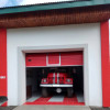 Garage sectional doors 40 mm RIB / woodgrain color-RAL 3000 Red