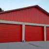 Garage sectional doors 40 mm RIB / woodgrain color-RAL 3000 Red