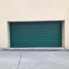 Sectional garage doors 40 mm RIB / woodgrain color-RAL 6005 green