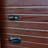 Sectional garage doors 40 mm RIB / woodgrain color-RAL 8017 brown