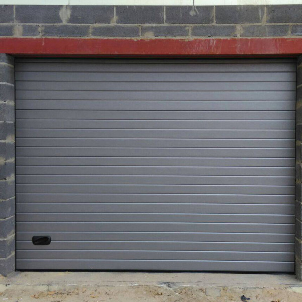 Garage sectional doors 40 mm RIB / woodgrain color-RAL 9006 silver
