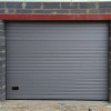 Garage sectional doors 40 mm RIB / woodgrain color-RAL 9006 silver