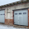 Garage sectional doors 40 mm RIB / woodgrain color-RAL 9006 silver