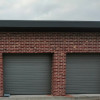 Garage sectional doors 40 mm RIB / woodgrain color-RAL 9007 silver