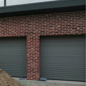 Ворота гаражні секційні 40 мм RIB/stucco  Колір - RAL 9007 Сріблястий