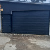 Garage sectional doors 40 mm MIDRIB / woodgrain color-RAL 7016 Dark gray
