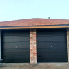 Garage sectional doors 40 mm TOPRIB / woodgrain color-RAL 7016 Dark gray