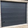 Garage sectional doors 40 mm TOPRIB / woodgrain color-RAL 7016 Dark gray