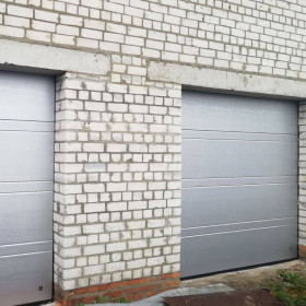 Ворота гаражні секційні 40 мм TOPRIB/woodgrain  Колір - RAL 9006 Сріблястий