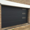 Sectional garage doors 40 mm Slick / smooth color-RAL 7016 Dark gray