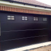 Sectional garage doors 40 mm Slick / smooth color-RAL 9005 black