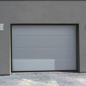 Sectional garage doors 40 mm MACRORIB / stucco color-RAL 9007 silver