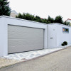 Sectional garage doors 40 mm MACRORIB / stucco color-RAL 9006 silver