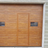 Garage sectional doors 40 mm CASSETE / Woodgrain color-Golden oak, golden oak