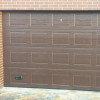 Garage sectional doors 40 mm CASSETE / Woodgrain color-RAL 8017 brown
