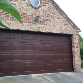 Garage sectional doors 40 mm CASSETE / Woodgrain color-RAL 8017 brown
