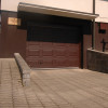 Garage sectional doors 40 mm CASSETE / Woodgrain color-RAL 8017 brown