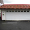 Garage sectional doors 40 mm CASSETE / Woodgrain color-RAL 9016 White