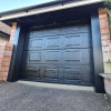 Garage sectional doors 40 mm CASSETE / Woodgrain color-RAL 9005 black